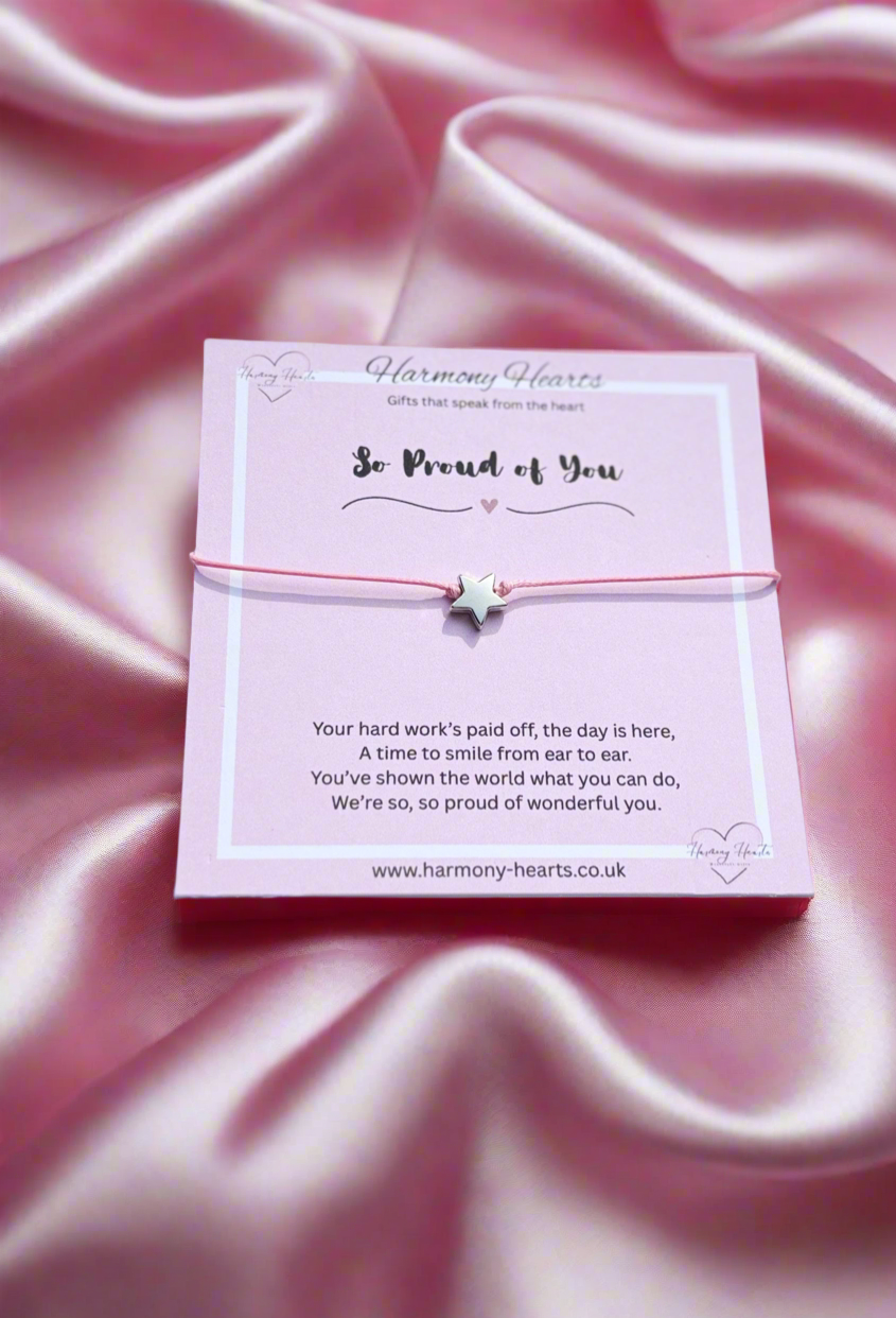Bracelet with message card on a pink satin background