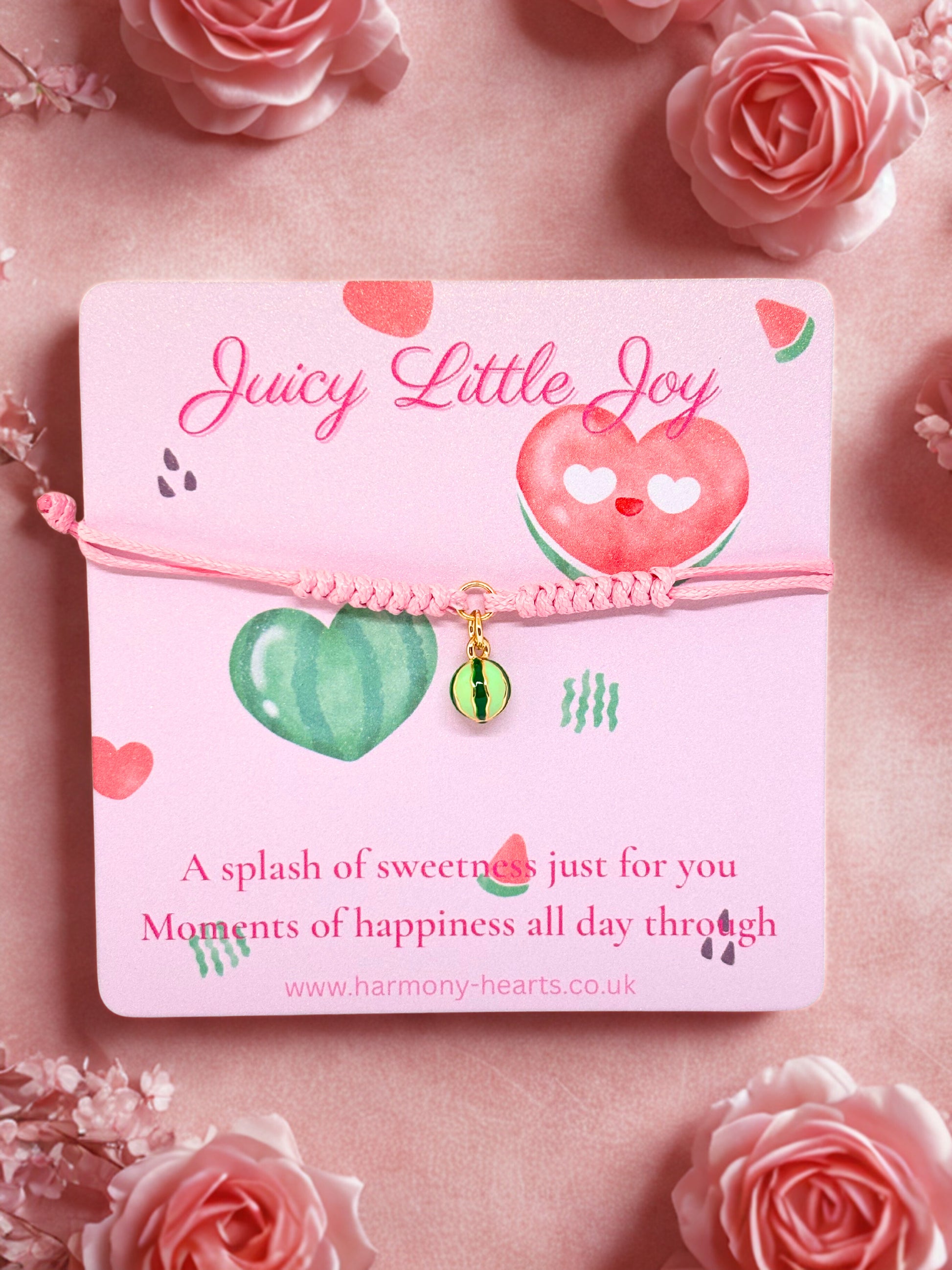 Pink cord bracelet with watermelon charm on a watermelon theme card with pink background with flowers