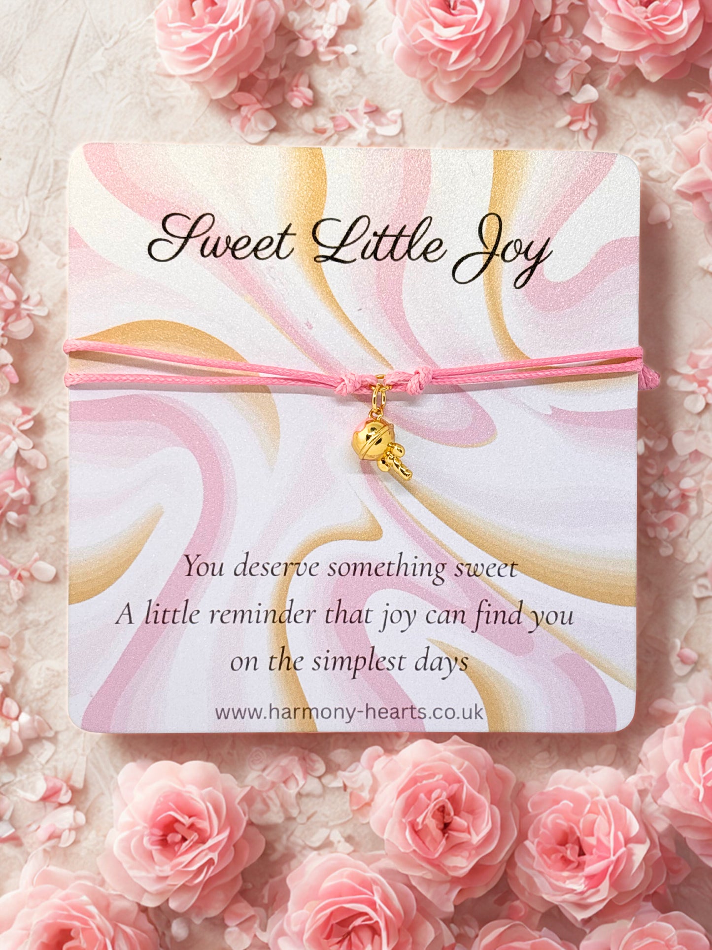 Pink cord charm bracelet with a pink and gold ice cream charm presented on a branded Harmony Hearts card Sweet Little Joy