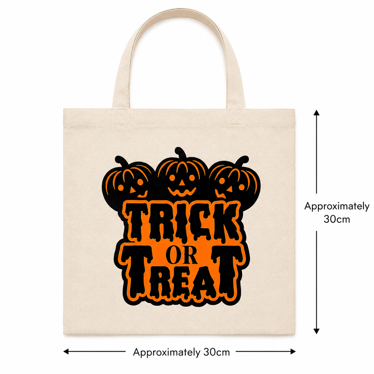 A natural canvas tote bag with a Halloween graphic that reads 'TRICK OR TREAT' in orange and black dripping letters beneath three jack-o'-lantern faces. Black dimension arrows and text indicate approximately 30cm height and width.
