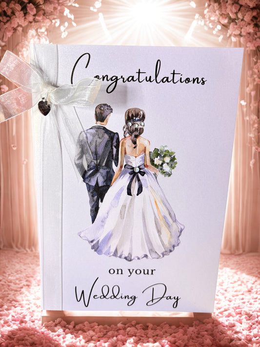Wedding card with a couple illustration and 'Congratulations on your Wedding Day' text, surrounded by decorative elements.