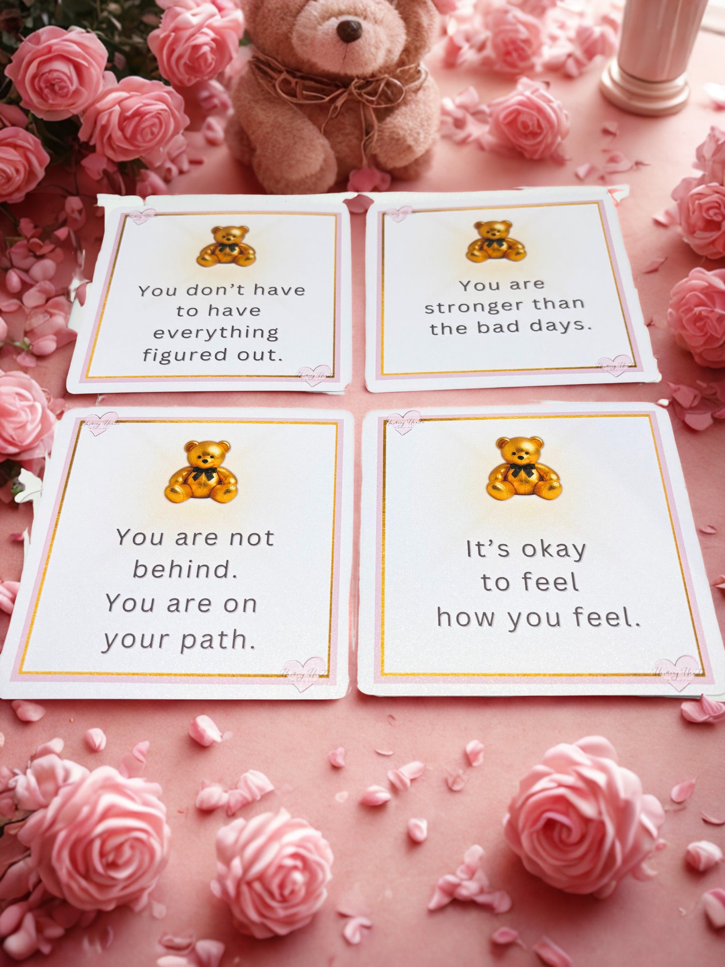 Motivational cards with teddy bear illustrations on a pink background with flowers