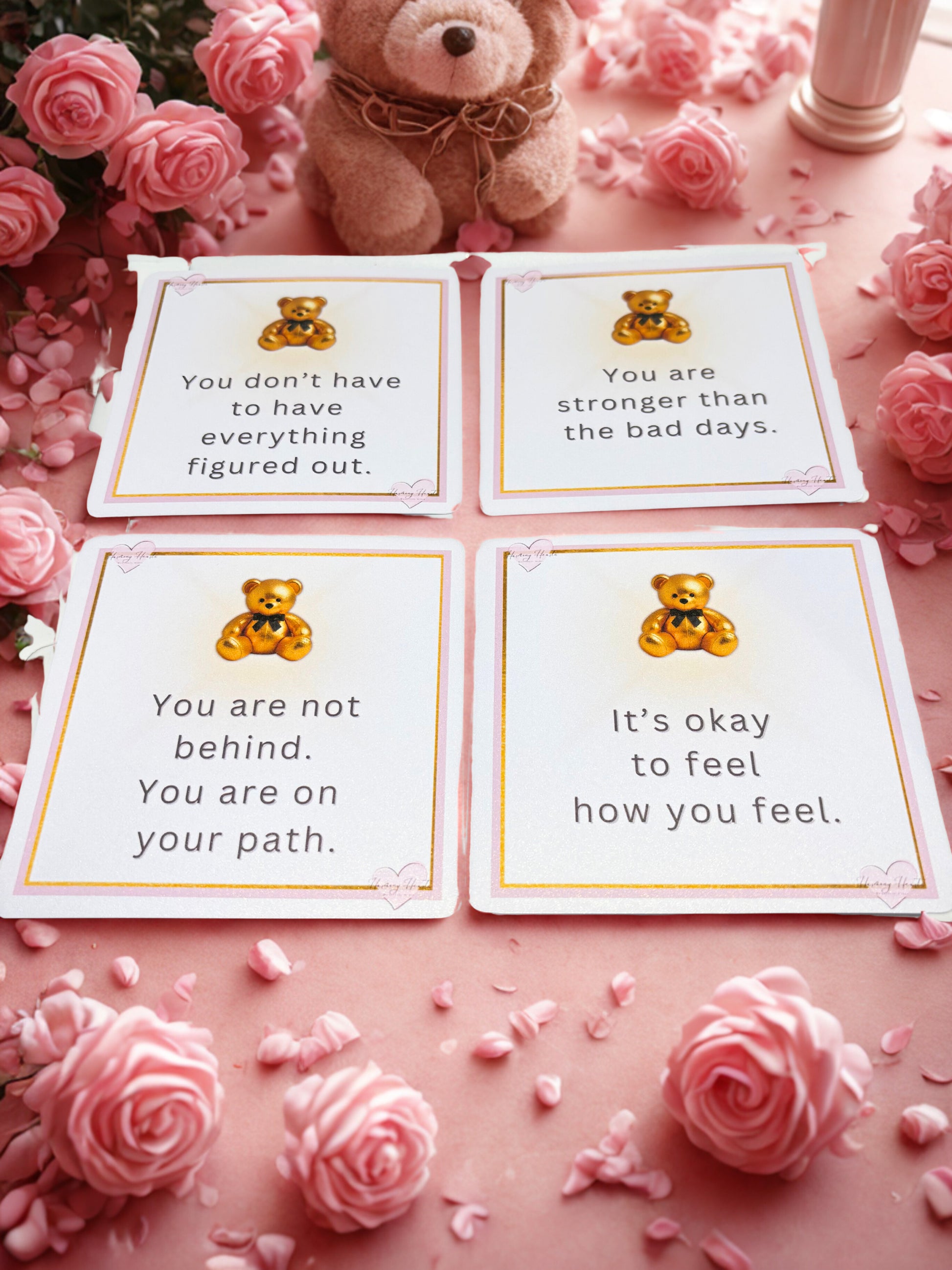Motivational cards with teddy bear illustrations on a pink background with flowers