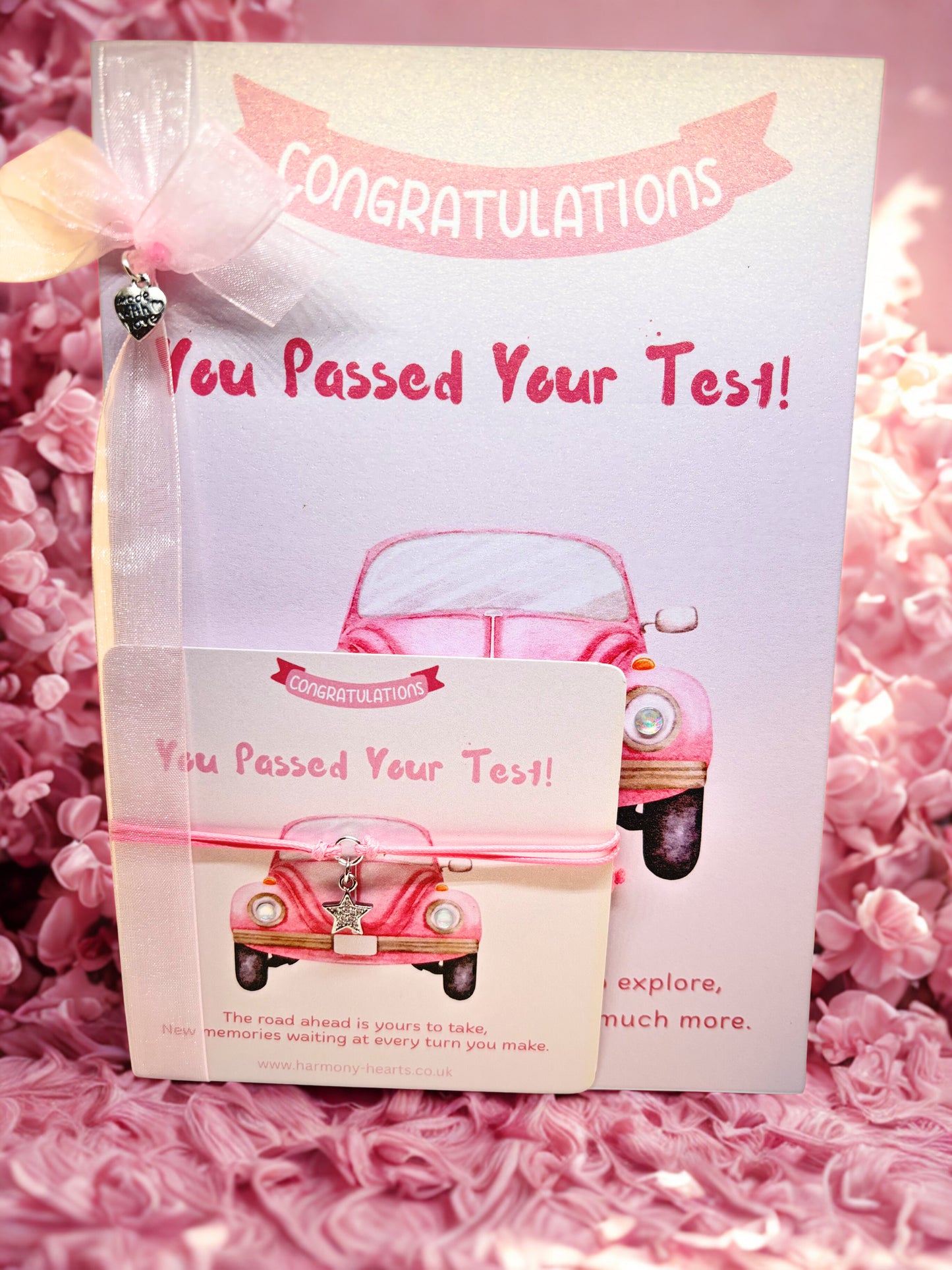 Congratulations you passed your driving test card and bracelet keepsake with pink car illustration