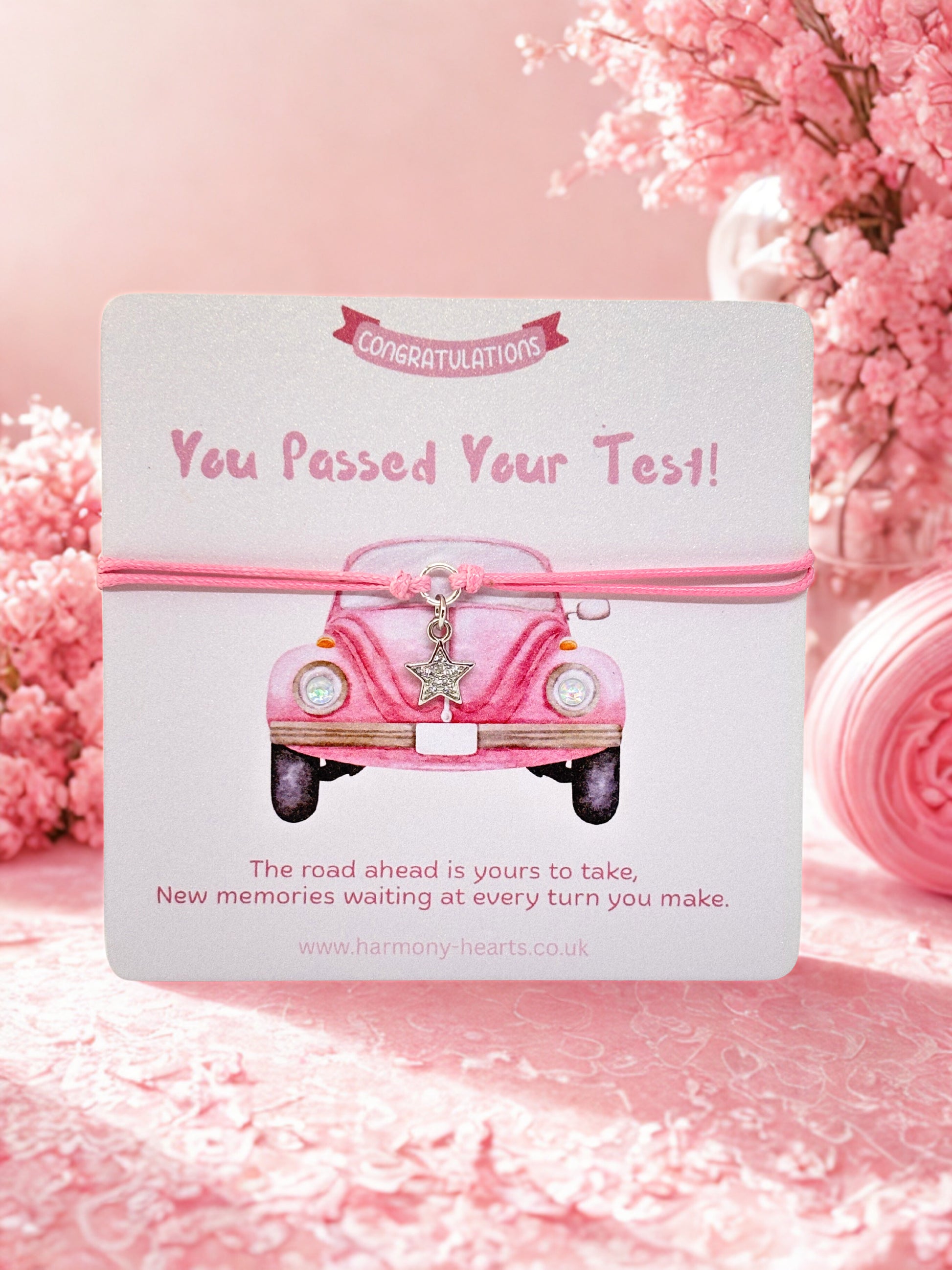You passed your driving test branded card by Harmony Hearts and pink cord bracelet with star charm